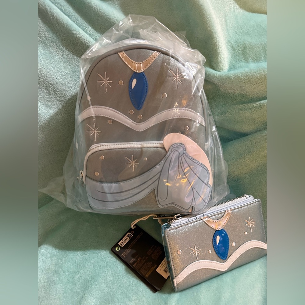 Loungefly Disneys Tiana in her blue dress backpack and matching wallet